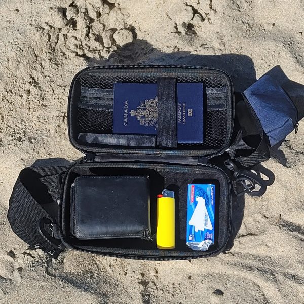Travel Pouch – Lockable and smell proof hard shell carry-on bag - Hard case with with an adjustable shoulder lace with a small pocket on it - Image 3