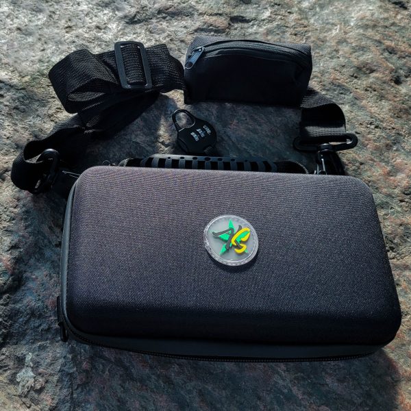 Travel Pouch – Lockable and smell proof hard shell carry-on bag - Hard case with with an adjustable shoulder lace with a small pocket on it - Image 9